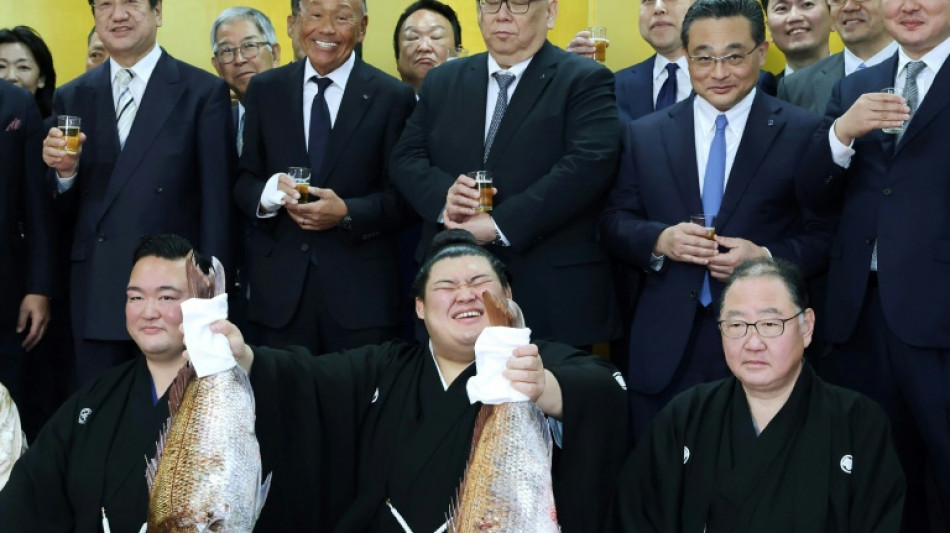 Onosato, 24, promoted to sumo grand champion in record time