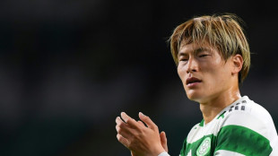 Celtic beat Hearts to retain Scottish Premiership title