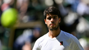 Smiling through: Alcaraz won't let Wimbledon defeat get him down