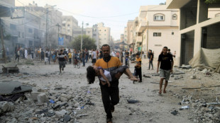 A week into war, Gazans flee homes as Israeli ground offensive looms
